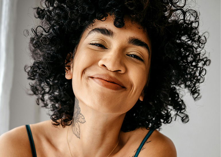 IV Therapy Super Immunity Wellness (Desktop) Woman smiling and enjoying a healthy lifestyle