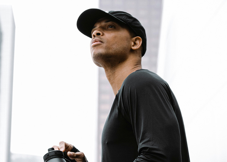 NAD+ IV Therapy Fitness About (Desktop) Man staying active as part of a wellness and fitness routine